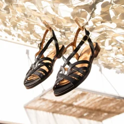 Shop Sandales plates brides cuir irisé noir Femme Sandales